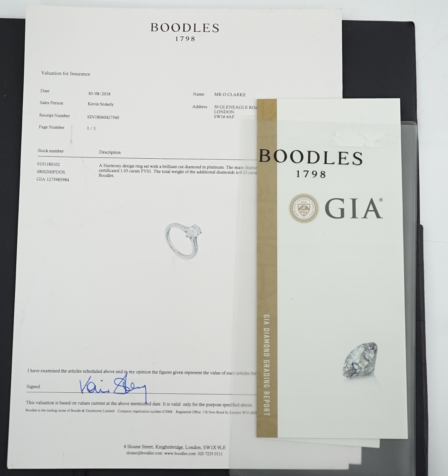 A recent Boodles platinum and single stone pear cut diamond set Harmony design ring, with diamond chip set shoulders and setting